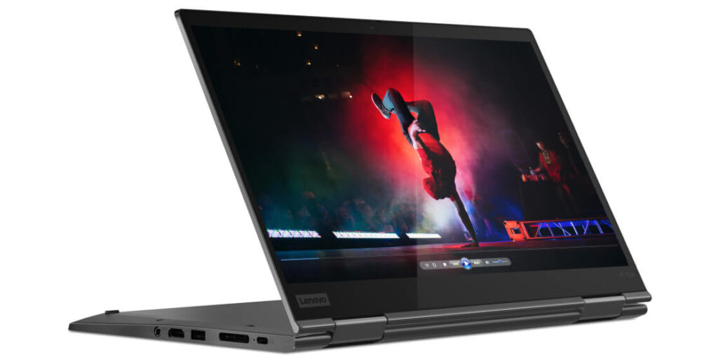 Auf dem Bild ist ein Lenovo Yoga Notebook zu sehen. Das Display des Notebooks ist umklappbar, sodass der Laptop auch mit nach hinten geklappter Tastatur wie ein Tablet genutzt werden kann.